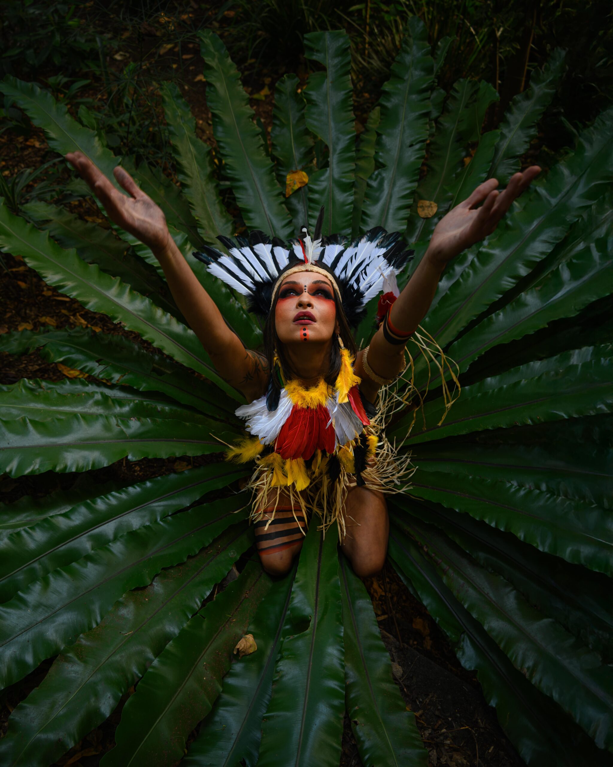South American Indigenous Woman Celebrating In Leaves